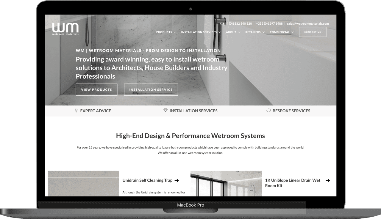 The wetroom materials homepage on a laptop