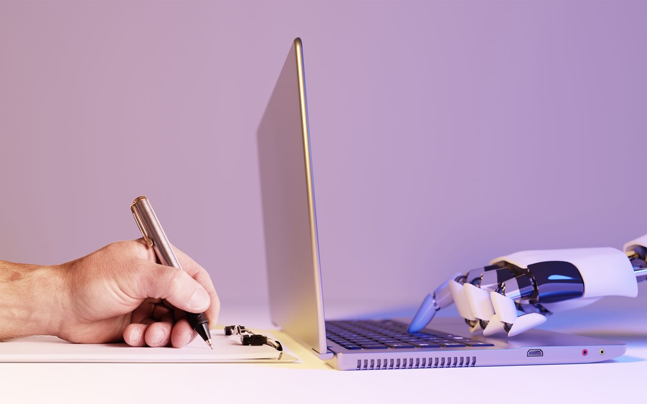 Human hand writing vs AI / Robot hand using a laptop