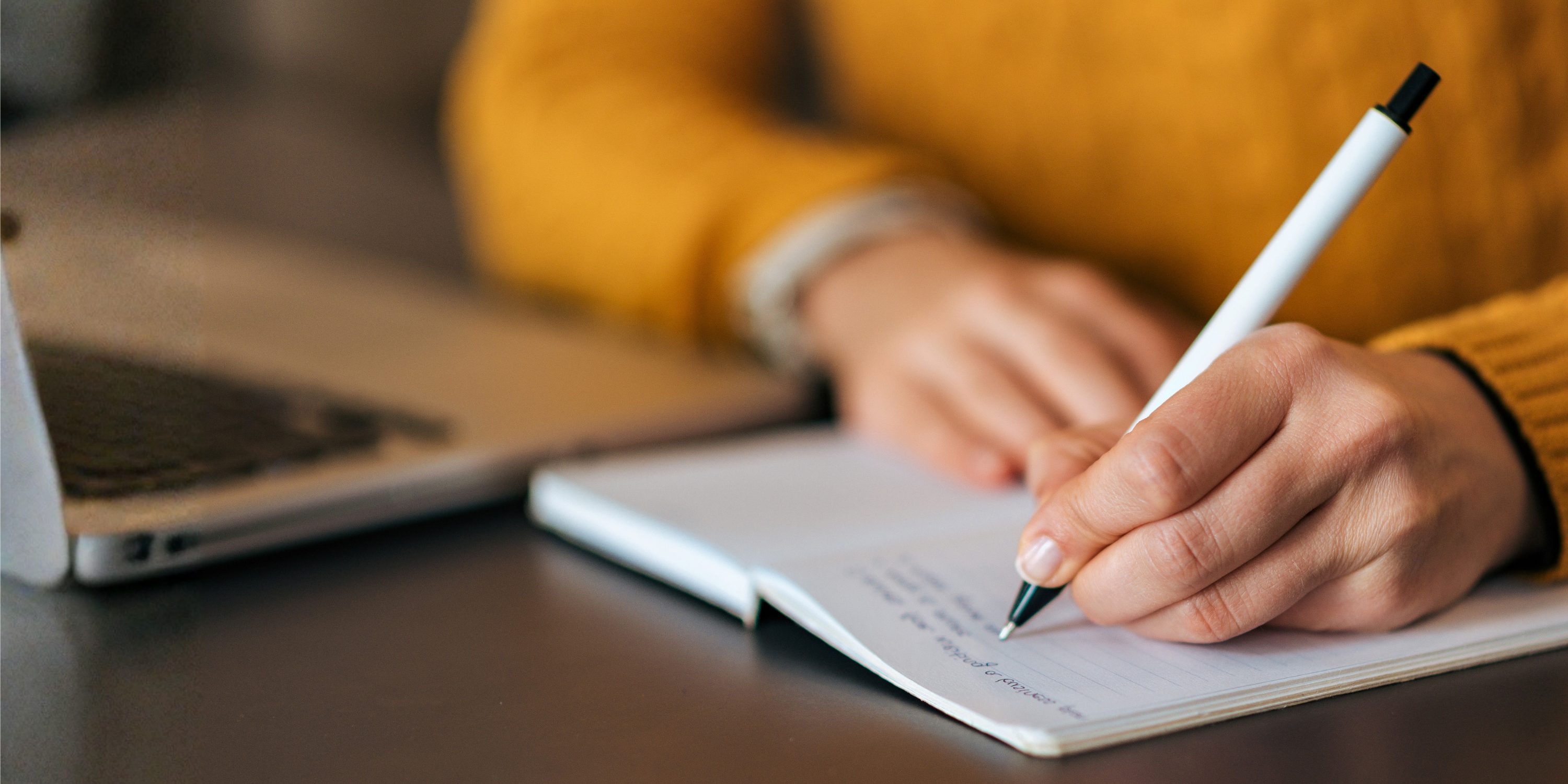 Hand writing in notebook